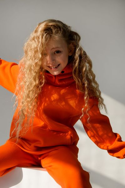 Дитячий теплий спортивний костюм на флісі унісекс помаранчевий tevi-1520 фото